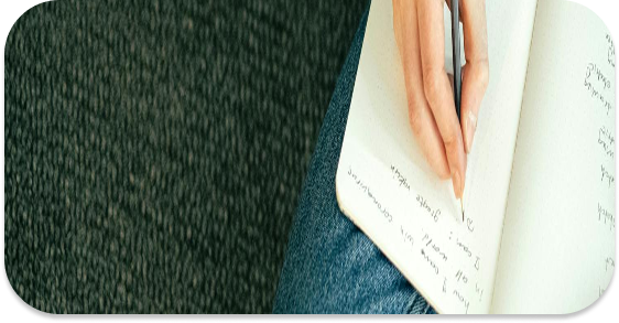 hand writing on a notebook